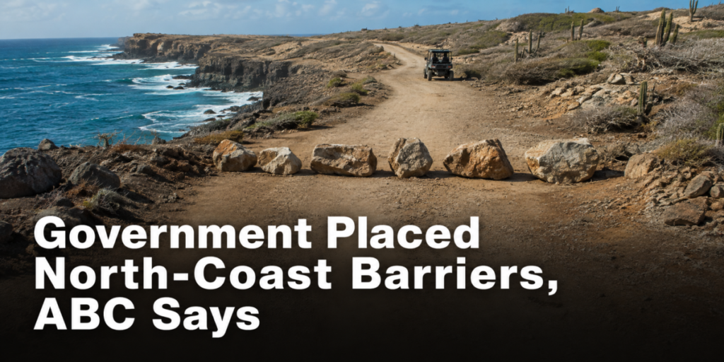 Rock barriers blocking a dirt route along Aruba's rugged north coast